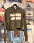 Cropped hoodie with a western lake design on a blurry store background