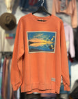 Orange sweatshirt with a graphic design of a sunset over water, hanging on a rack with other clothing in the background.