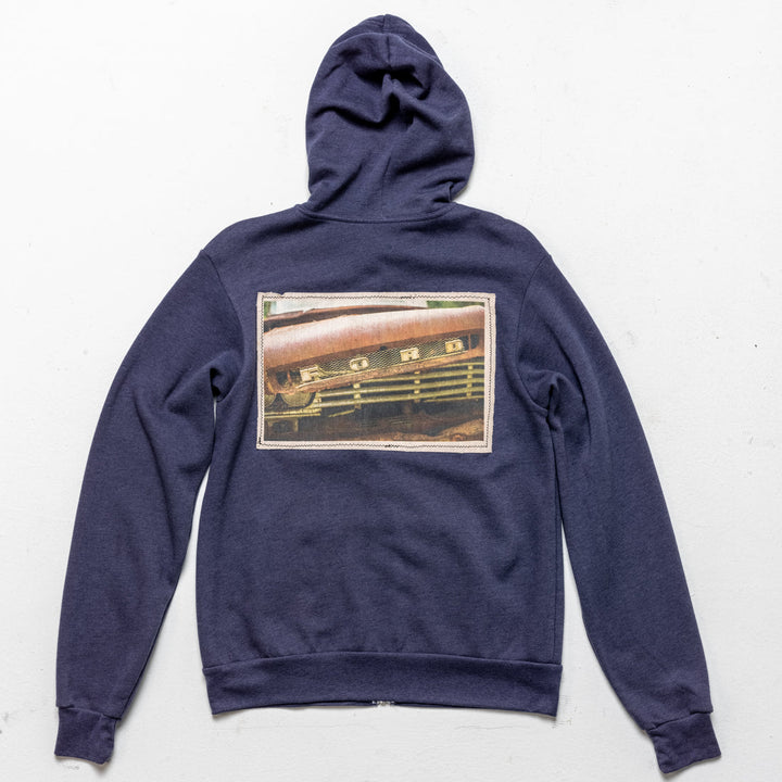 Custom Vintage Hoodie from Captured Clothing 30A made with upcycled band T-shirt patch, eco-friendly cotton, and handcrafted details