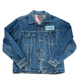 Blue denim jacket on a white background