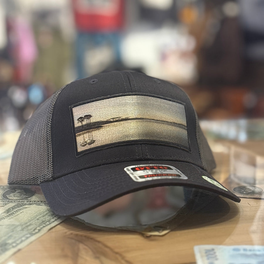 black otto hat with western lake patch on it 