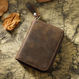 Brown leather wallet on an old map background