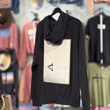 Black hoodie with a graphic of a surfer on a hanger against a clothing store background